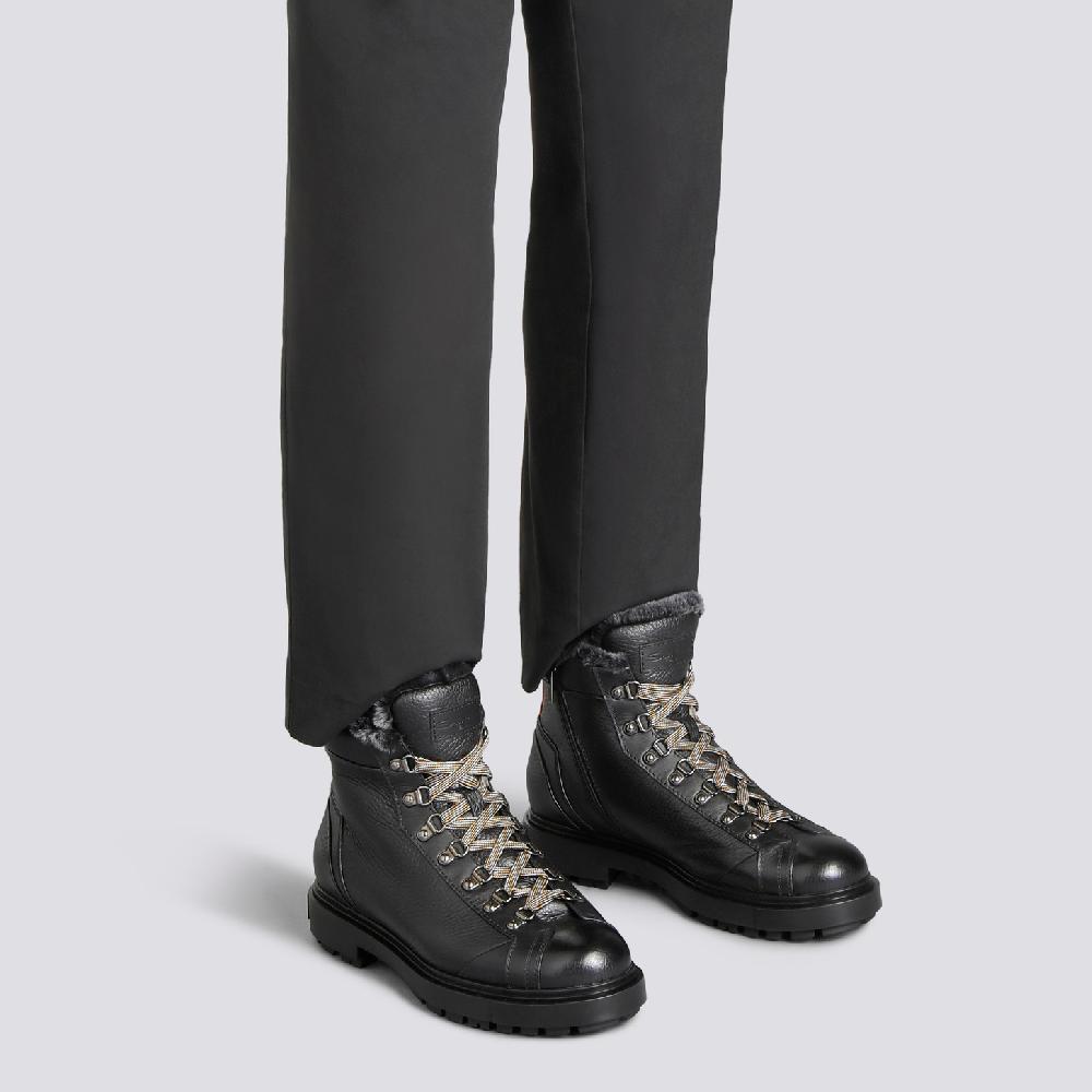 Santoni Scarponcino da montagna da uomo in pelle bottalata nera con pelliccia Acquista Ora